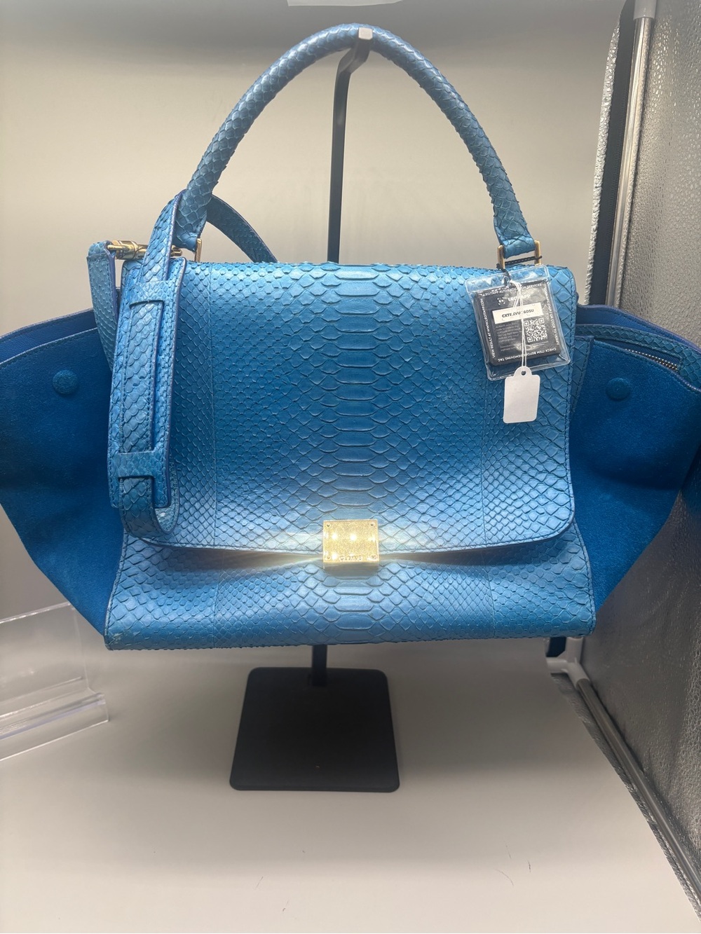 Celine Trapeze bag featuring blue python skin and suede